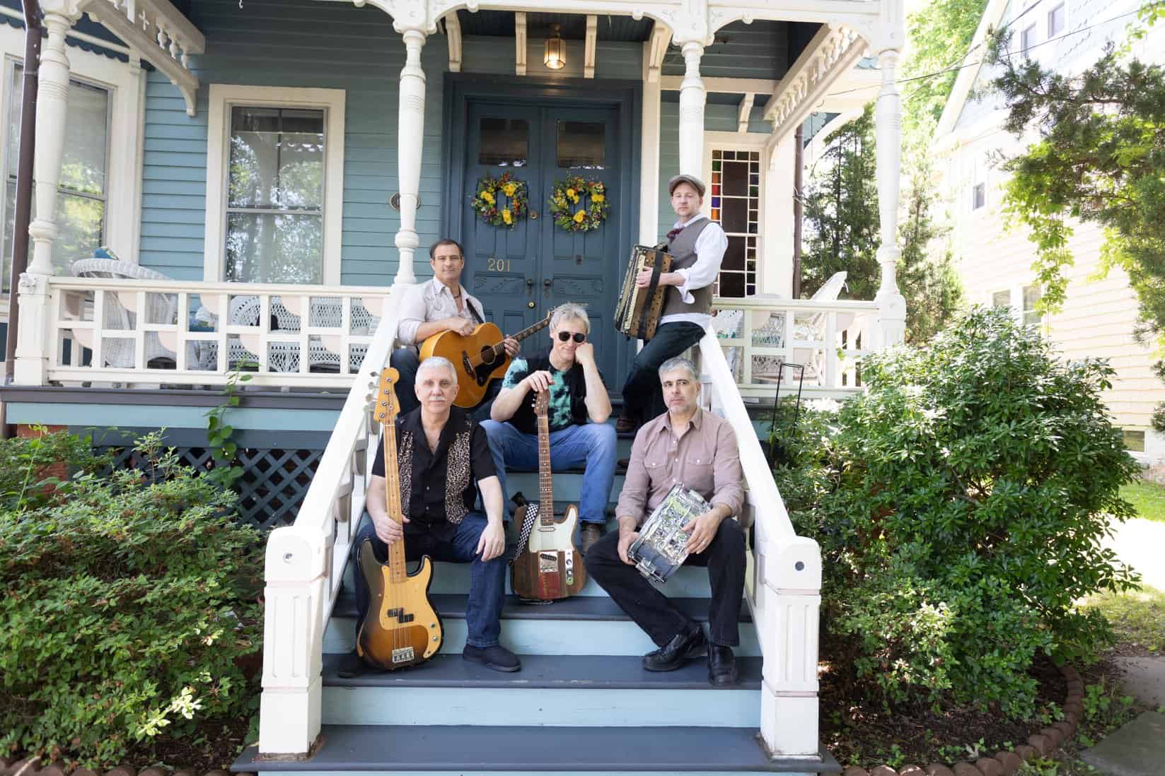 The Accidental Gypsies on a Victorian porch