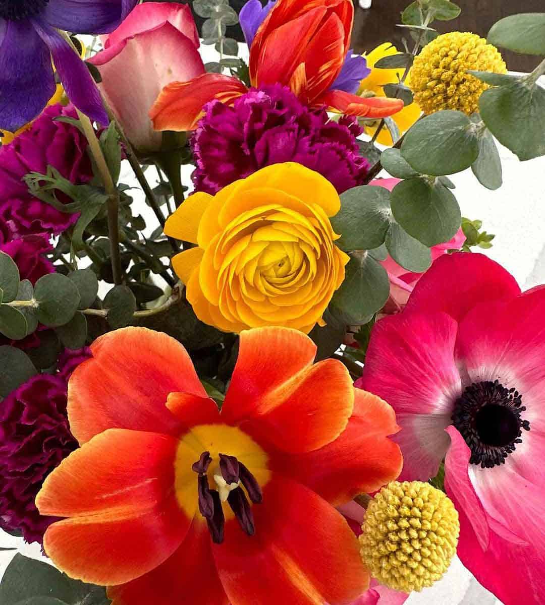 Close up of colorful floral bouquet by Pimental Floral Design