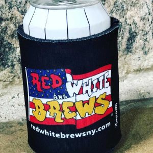 A can of beer with a Red White and Brews koozie