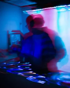 Blurry photo of DJ 4AM at the turntables