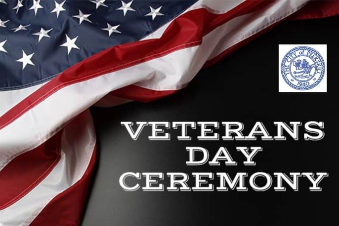 Flyer for Peekskill Veteran's Day Ceremony with an American flag waving in the background