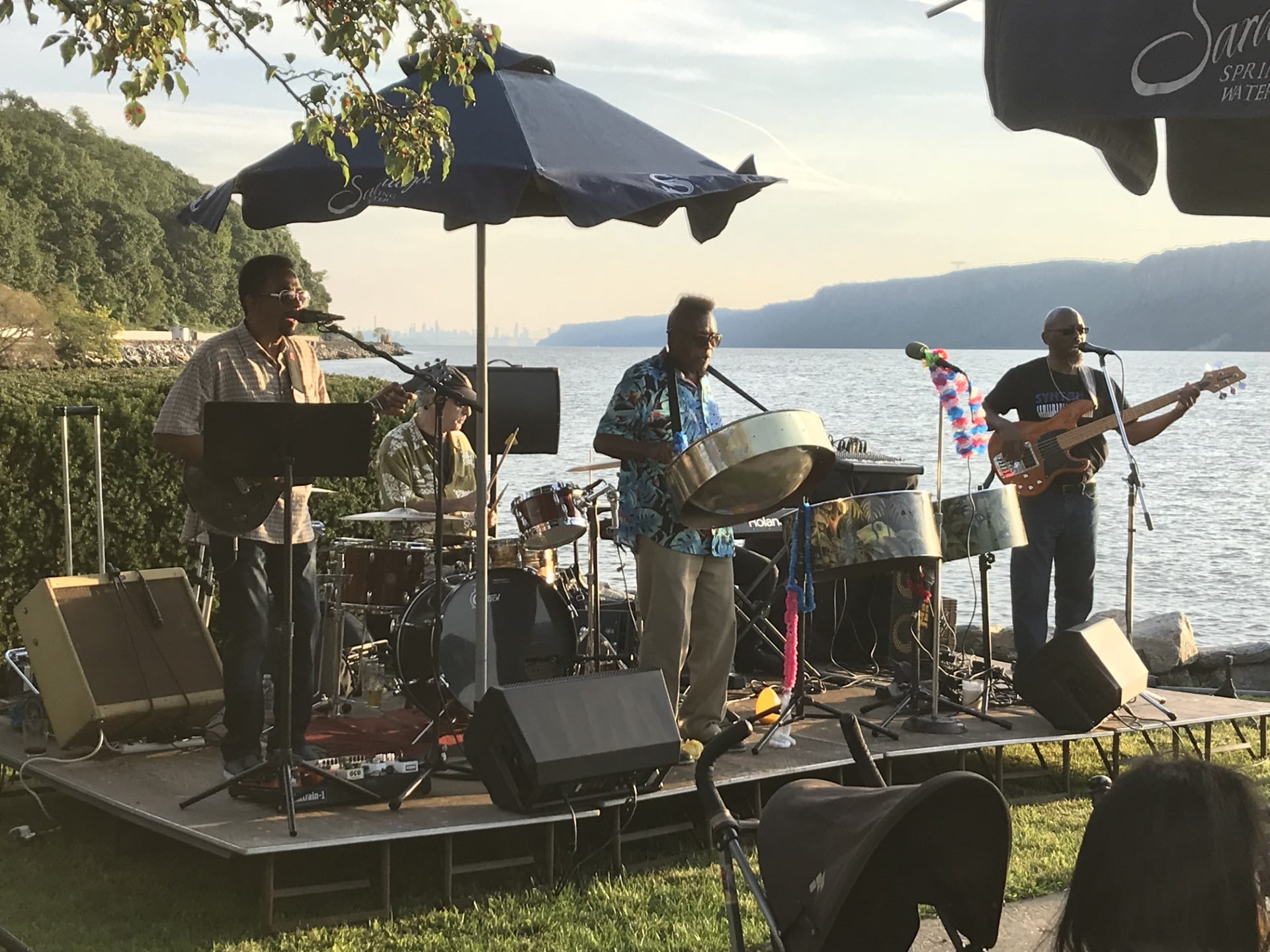 Caribbean Island Sound Band playing outside along the Hudson River