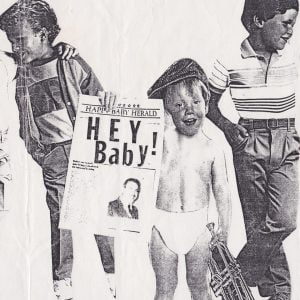 Fun promotional image with a baby holding a newspaper that reads "Hey Baby"