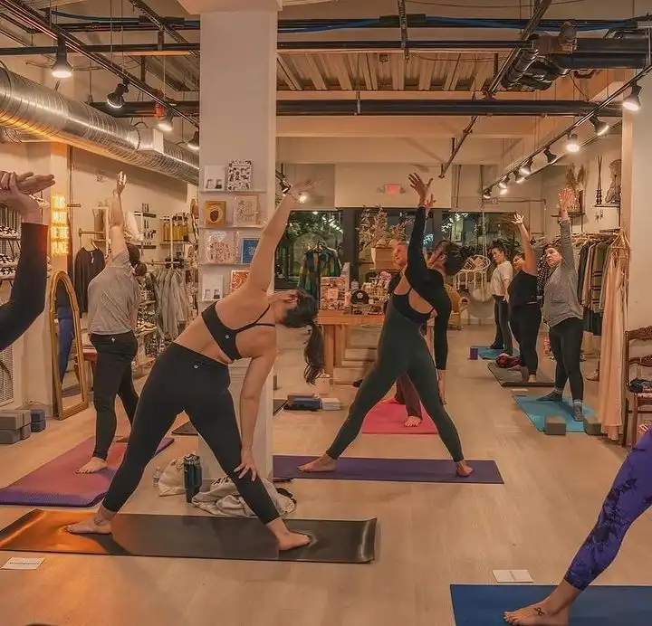Yoga practice in the shop via Soulaligned x The Lounge House
