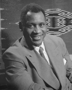 Black and white portrait photograph of Paul Robeson