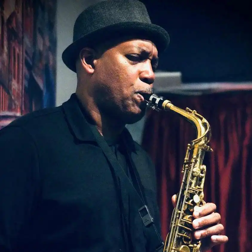 Portrait of Eric Person playing the sax
